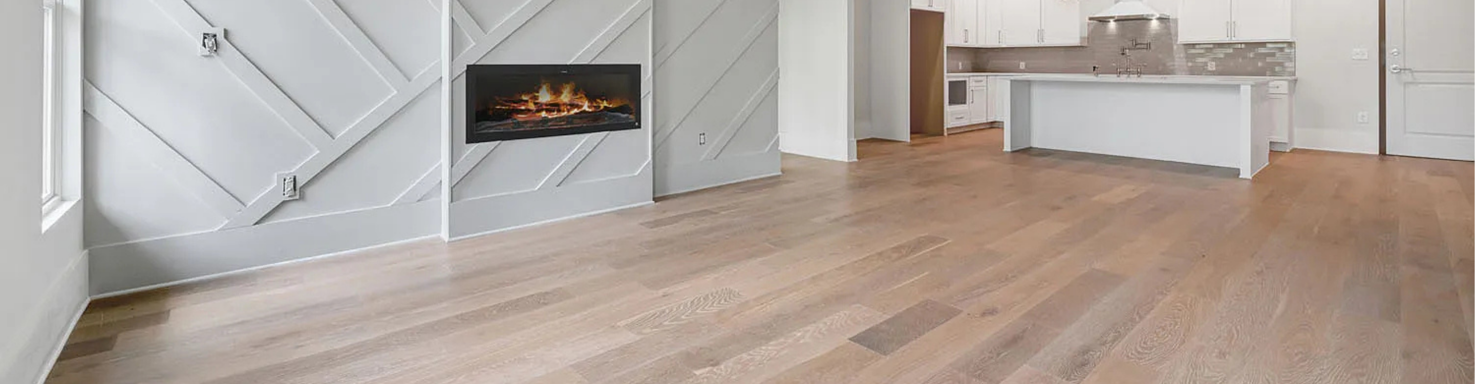 Wide-plank oak hardwood floor installed in a new construction great room by Top Floors Carpet One in Suwanee GA