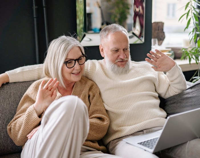 Retired couple relaxing comfortably at home