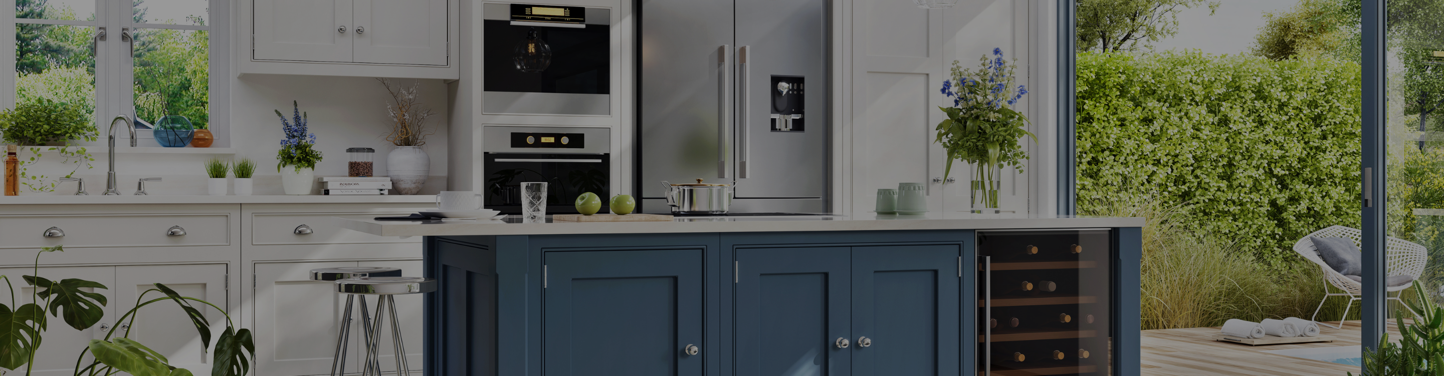 Grey and white kitchen with light counters 