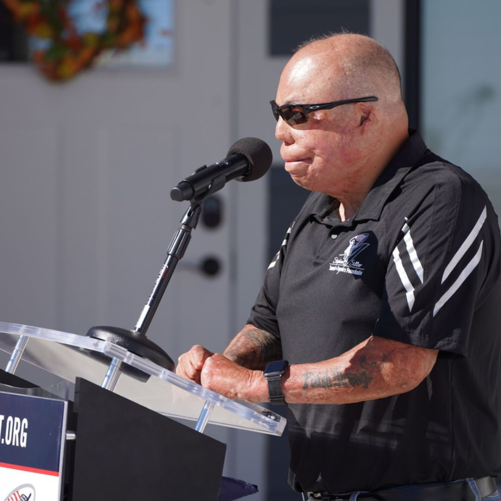 Wounded veteran supported by Tunnel to Towers Foundation. Top Floors Carpet One provides flooring for smart homes, honoring service members' sacrifices and enhancing their quality of life in Gwinnett 